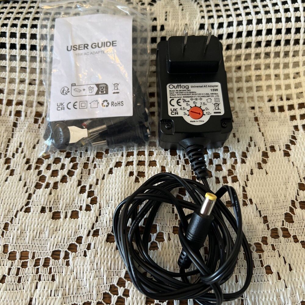 Outtag Universal AC Adapter 15 W Removed From Box Never Used